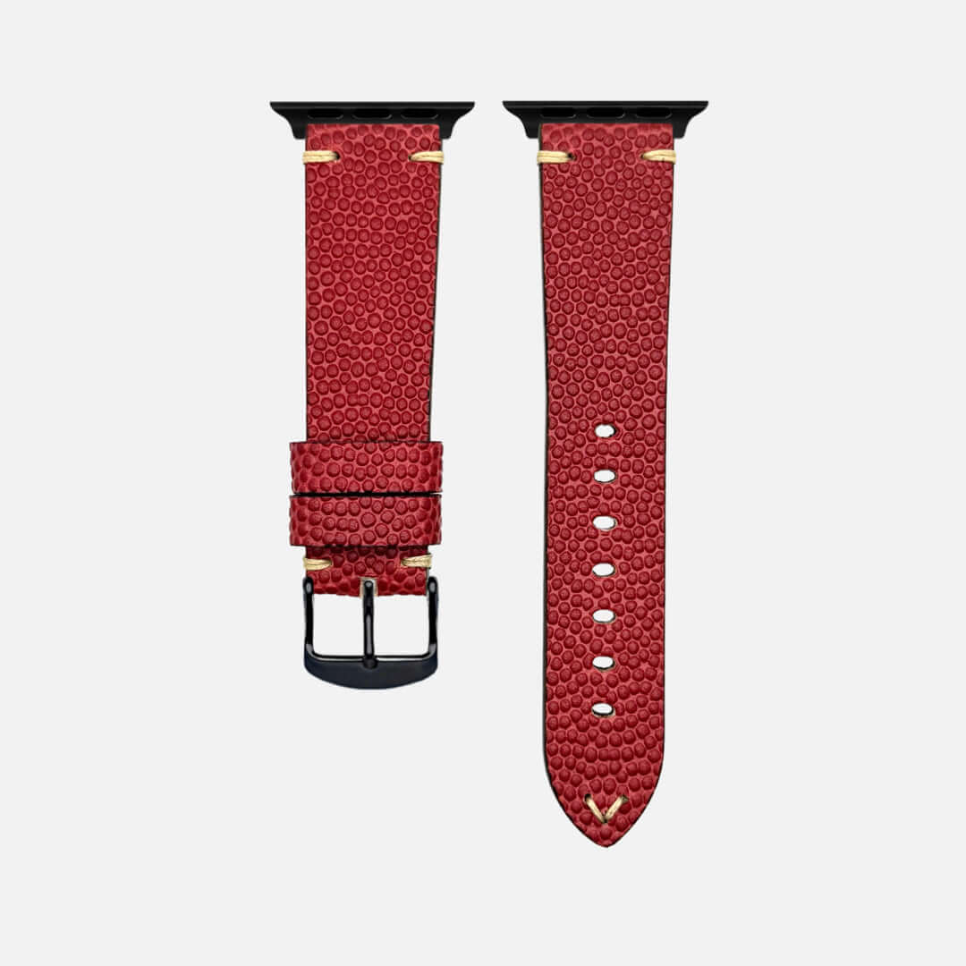 Rotes Uhrenarmband mit strukturierter Oberfläche und schwarzer Schließe für elegante Zeitmesser