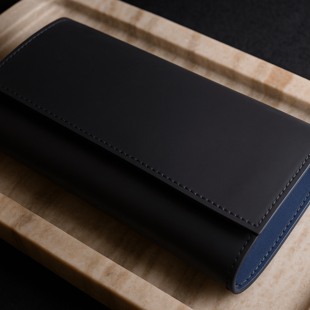 Luxurious black Barenia leather watch case for three watches, elegant and premium design.