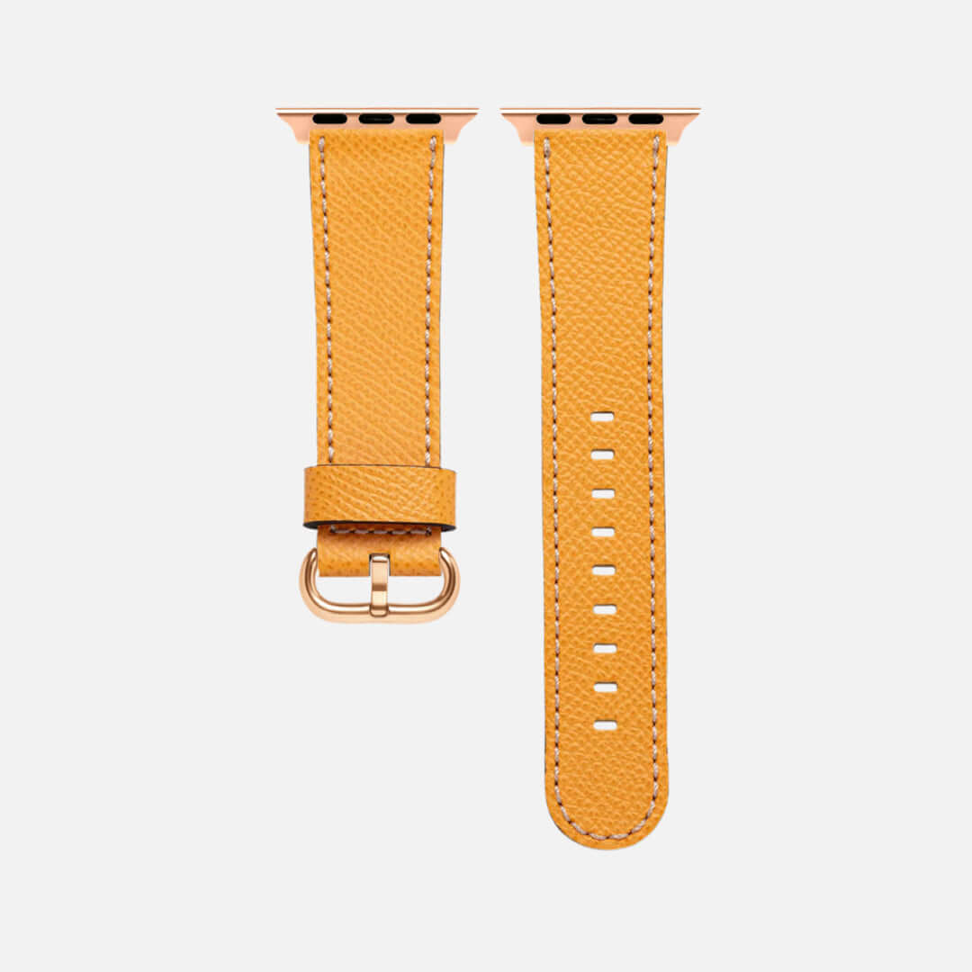 Luxuriöses Apple Watch Lederarmband Damen Cupertino Gelb aus hochwertigem Epsom Kalbleder in kräftigem Gelb auf weißem Hintergrund.