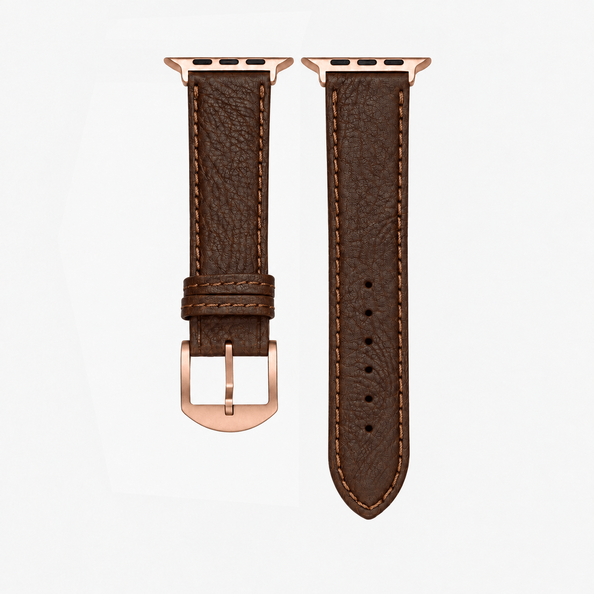Apple Watch Stierlederarmband Torro Modern Dunkelbraun mit rose-goldener Schnalle und charaktervoller Lederstruktur.
