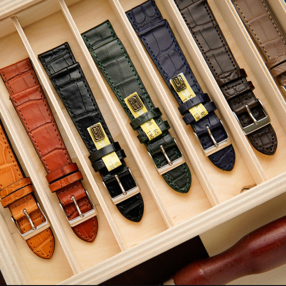 Auswahl von Louisiana Alligator Uhrenarmband in verschiedenen Farben in einer Holzbox
