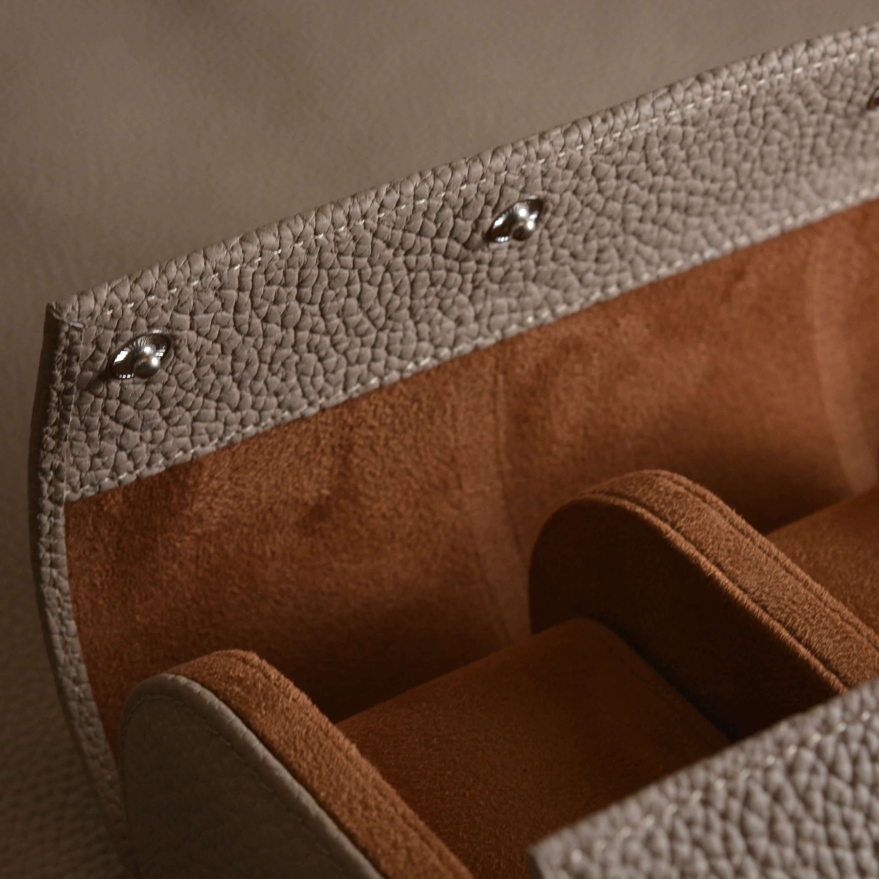 Interior view of hand-crafted Uhrenrollen Leder Togo watch roll made from high-quality Togo leather.