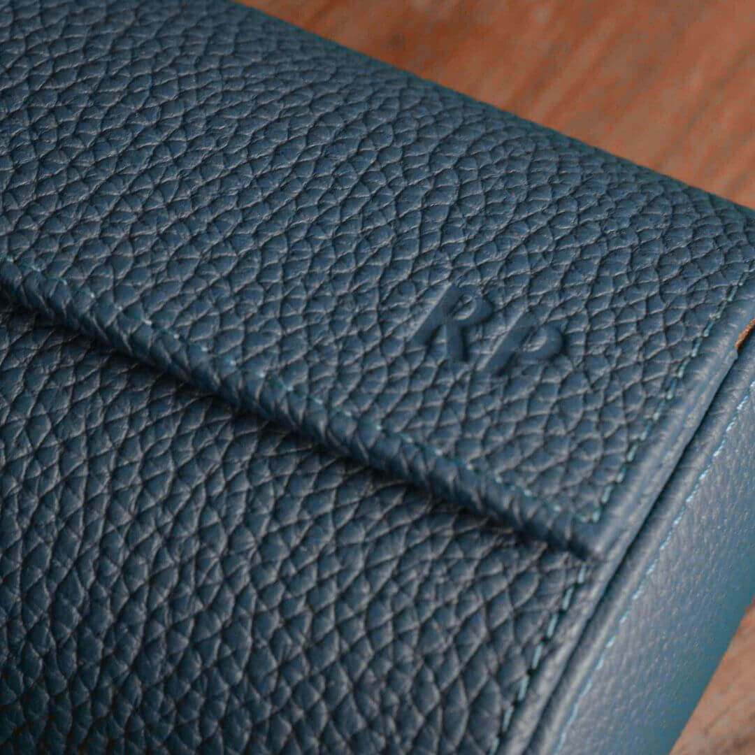 Close-up of handcrafted Uhrenrolle made from Togo leather, showcasing detailed texture and stitching, ideal for one watch.