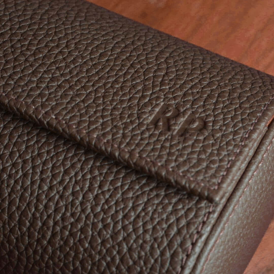 Close-up of handcrafted Togo leather watch roll for one watch by FLUCO, showcasing texture and craftsmanship.