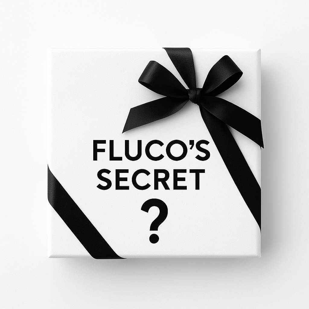 Fluco's Secret Box with black ribbon, containing a unique leather watch strap from Fluco's historic collection.