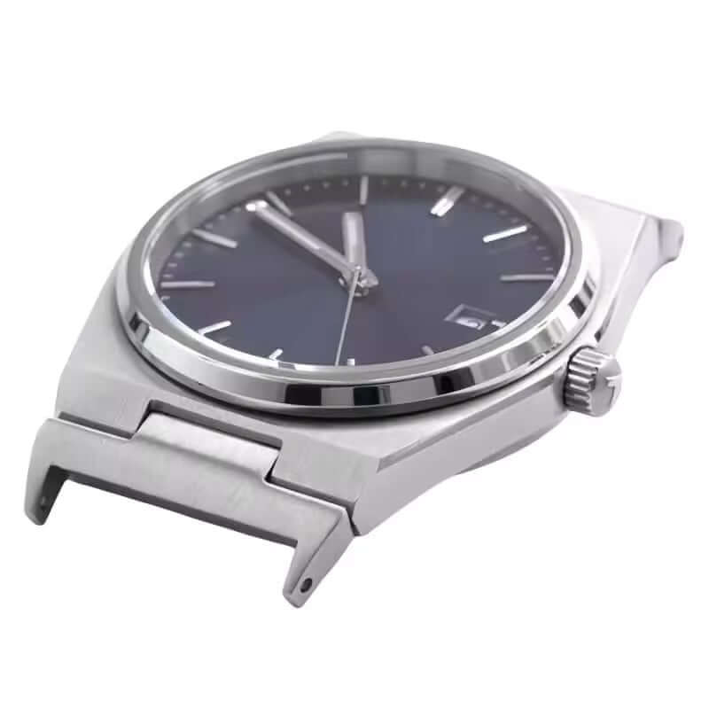 Close-up of a Tissot PRX watch case showing adapter compatible with 22mm straps, enhancing versatility with leather, steel, textile, or silicone.