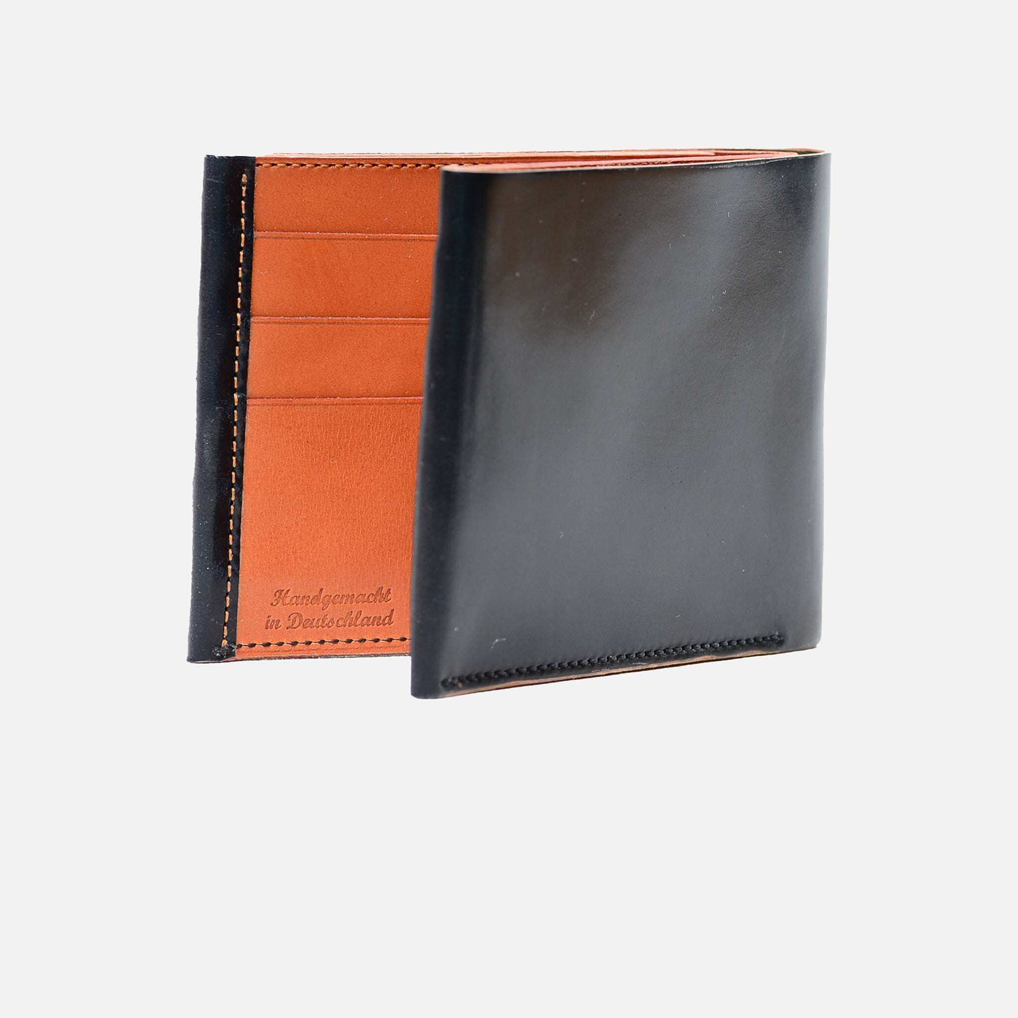 Geldbörse aus schwarzem Horween Shell Cordovan, Freisteller, luxuriöses und langlebiges Accessoire aus hochwertigem Leder