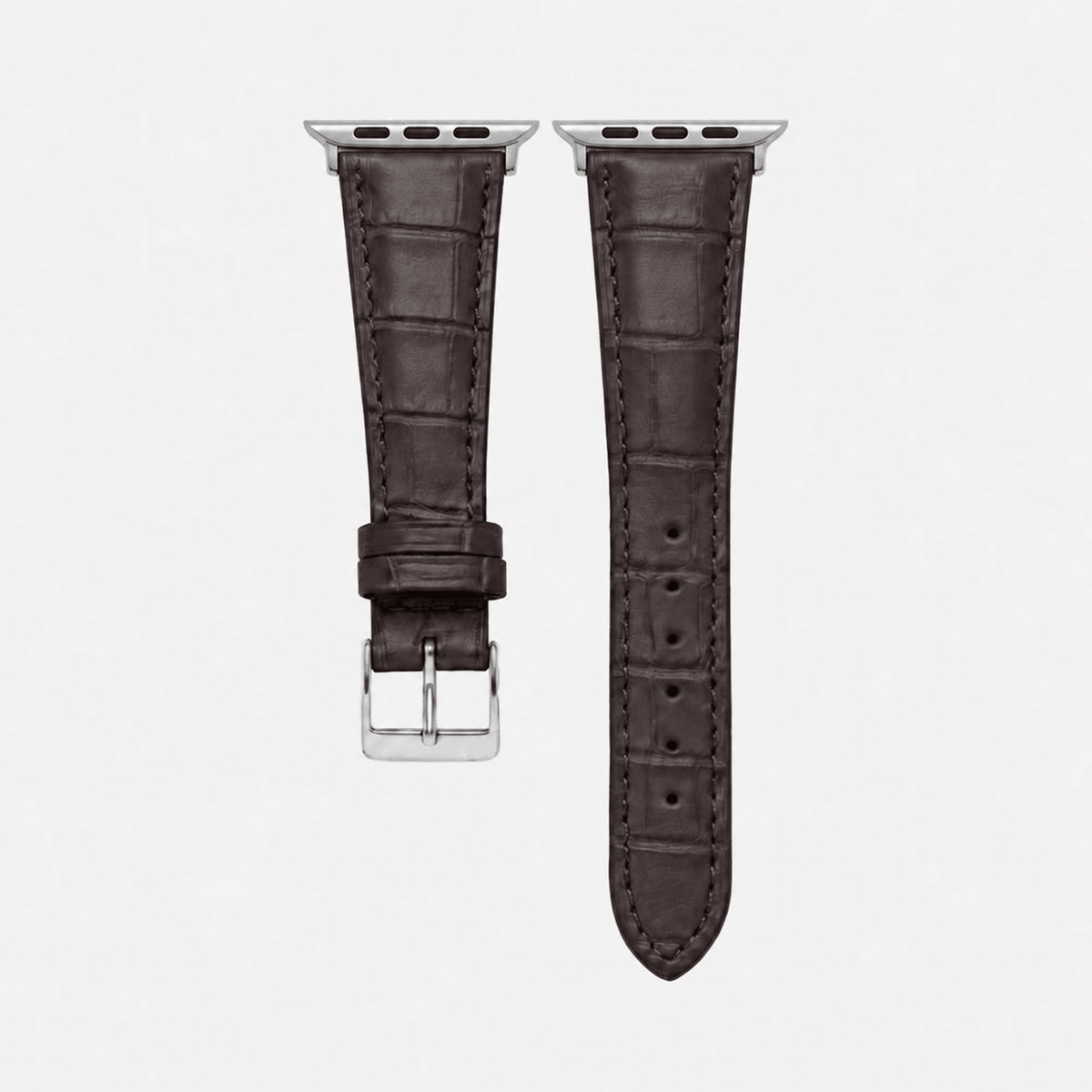 Dunkelbraunes Apple Watch Armband Louisiana Alligator Full Cut mit silberner Hardware im Detail.