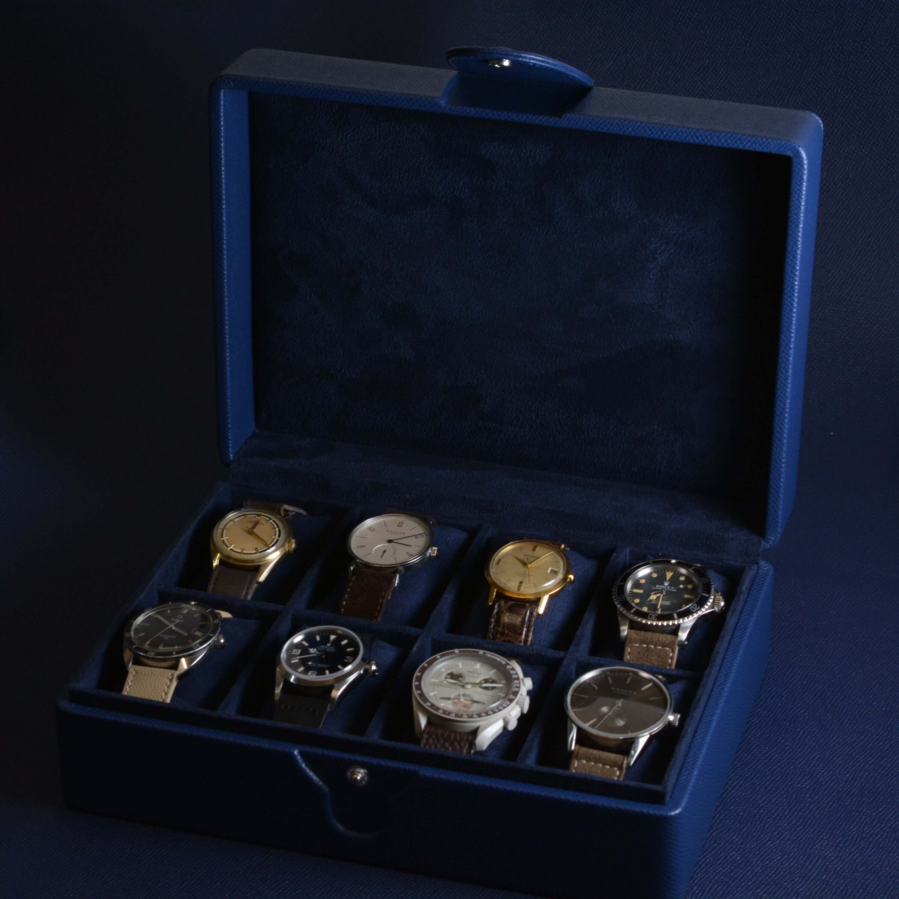 Luxurious blue leather watch box for 8 watches, made from durable Epsom leather, showcasing elegant timepiece storage and organization.