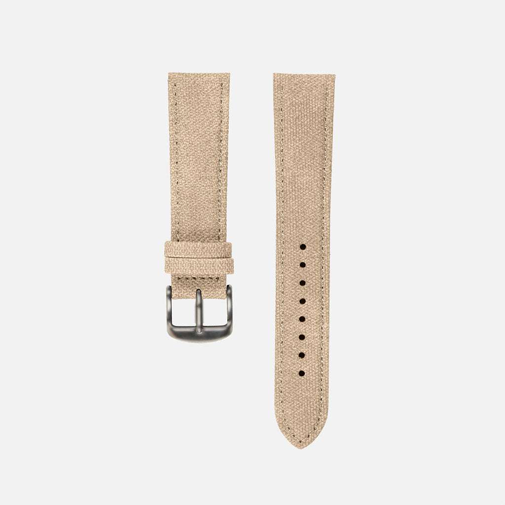 Beiges Canvas-Uhrenarmband als Freisteller für moderne Armbanduhren