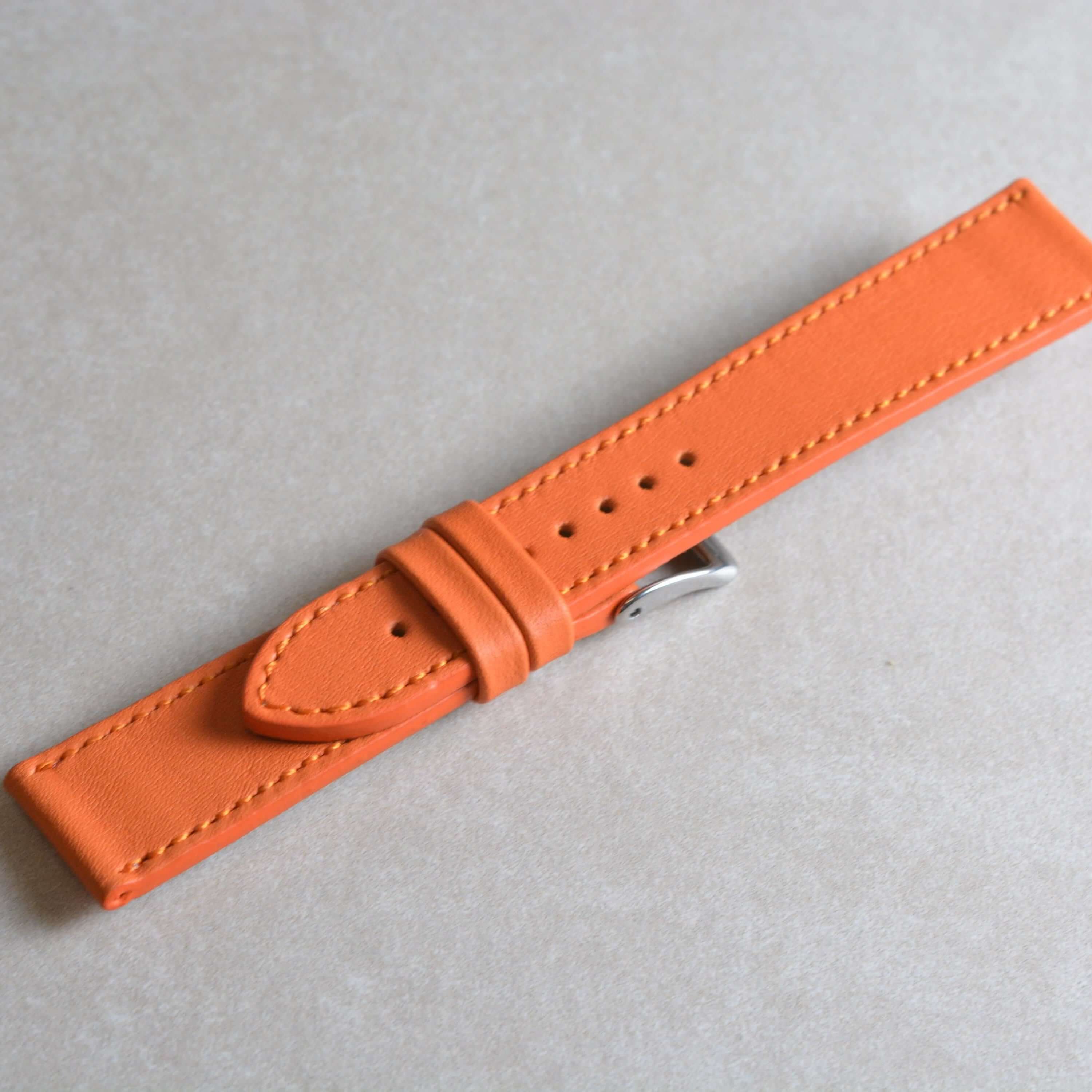 Swift – Uhrenarmband aus italienischem Swift Leder in leuchtendem Orange, hochwertiges Design.