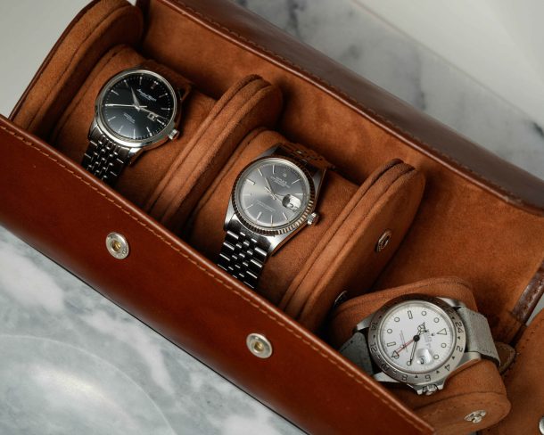 braune Uhrenrolle mit 3 Rolex Uhren drin